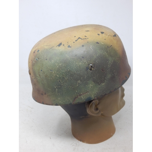 220 - A WWII German Paratroopers Helmet. Note: Customers must satisfy themselves prior to bidding in regar... 