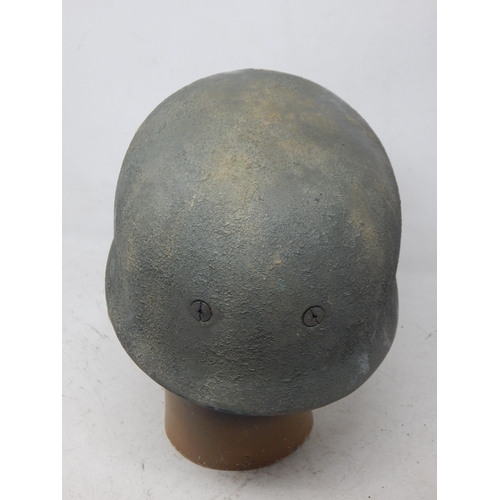 222 - A WWII German Paratroopers Helmet. Note: Customers must satisfy themselves prior to bidding in regar... 