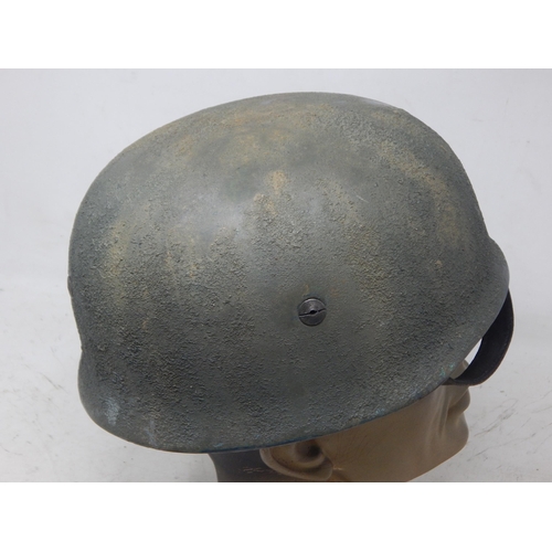 222 - A WWII German Paratroopers Helmet. Note: Customers must satisfy themselves prior to bidding in regar... 