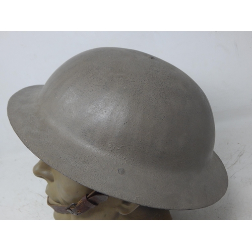 224 - WWI British Brodie Helmet with Raw Edge & Chin Strap. Note: Customers must satisfy themselves prior ... 