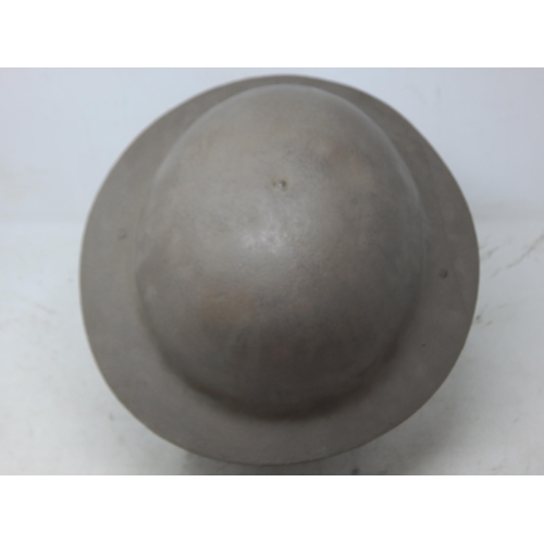 224 - WWI British Brodie Helmet with Raw Edge & Chin Strap. Note: Customers must satisfy themselves prior ... 