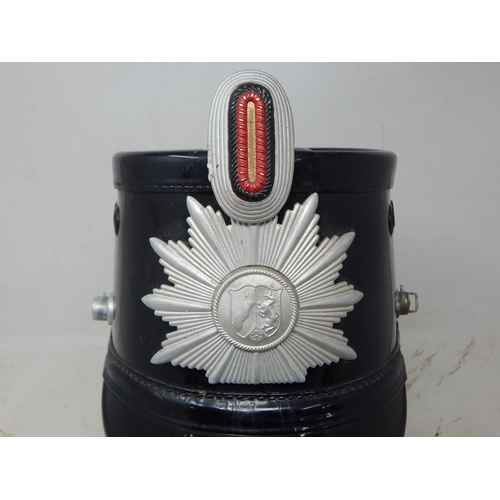 229 - WWII German Shako Helmet. Note: Customers must satisfy themselves prior to bidding in regard to cond... 