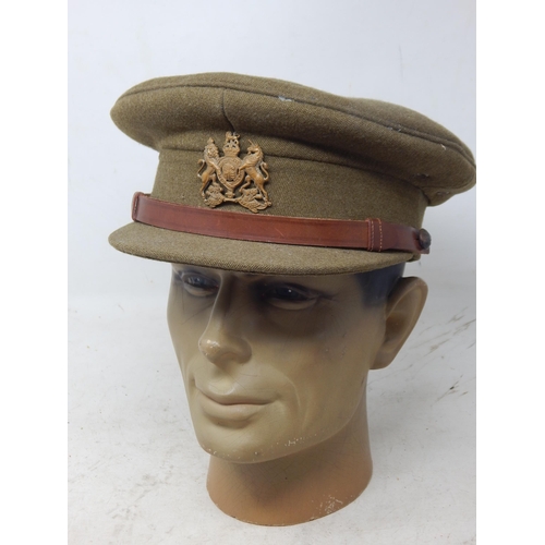 230 - WWII British Officers Peaked Visor Cap. Note: Customers must satisfy themselves prior to bidding in ... 