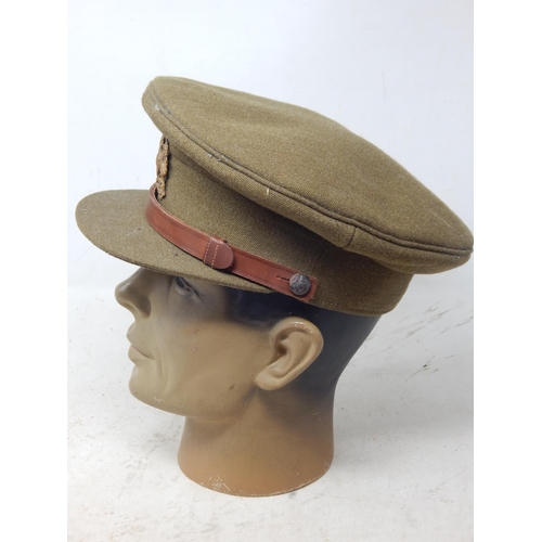 230 - WWII British Officers Peaked Visor Cap. Note: Customers must satisfy themselves prior to bidding in ... 