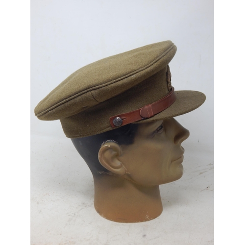 230 - WWII British Officers Peaked Visor Cap. Note: Customers must satisfy themselves prior to bidding in ... 