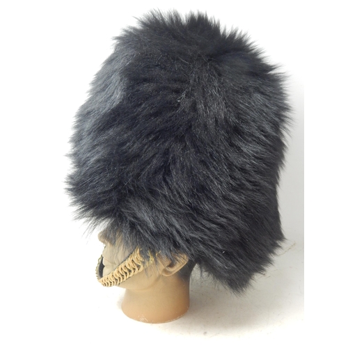 231 - British Post 1953 Guardsman Bearskin Headdress, fine example with original wicker frame to the inter... 