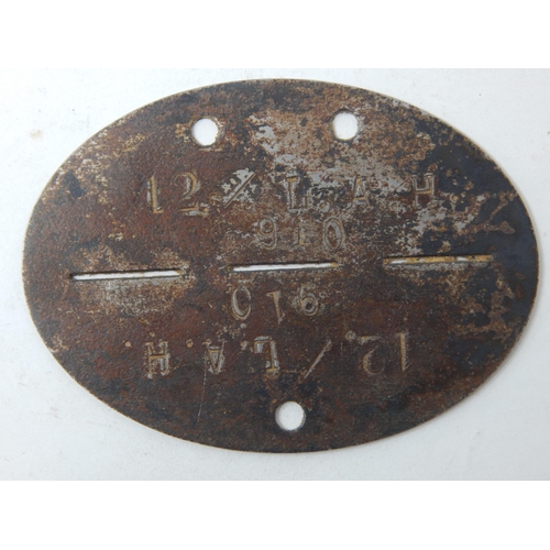 371 - WWII German WAFFEN SS Identity Disc: 910. SS. VERFUNUGGSTRUPPE. 12. /L. A. H