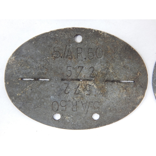 374 - WWII German Erkennungsmarke (Identification Tag): this was the standard-issue German military identi... 