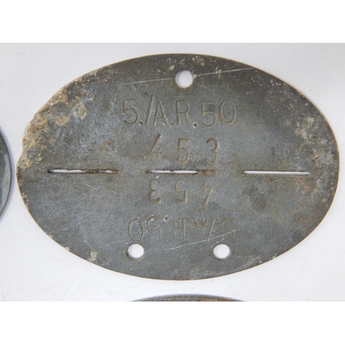 375 - WWII German Erkennungsmarke (Identification Tag): this was the standard-issue German military identi... 