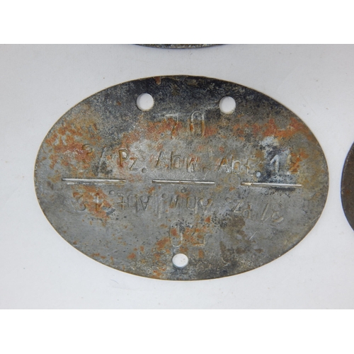 377 - WWII German Erkennungsmarke (Identification Tag): this was the standard-issue German military identi... 