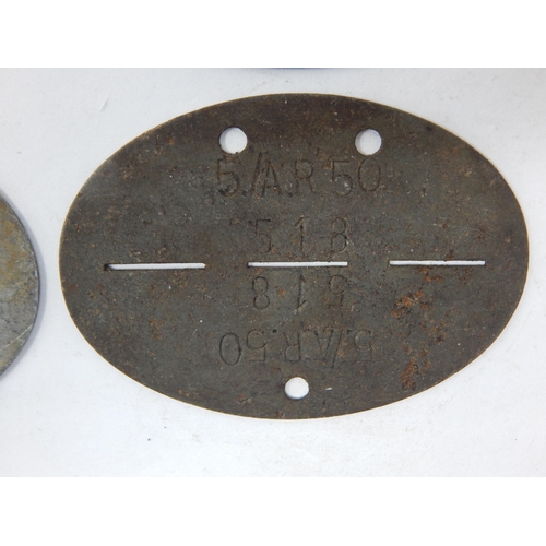 377 - WWII German Erkennungsmarke (Identification Tag): this was the standard-issue German military identi... 