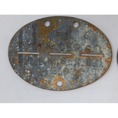 379 - WWII German Erkennungsmarke (Identification Tag): this was the standard-issue German military identi... 