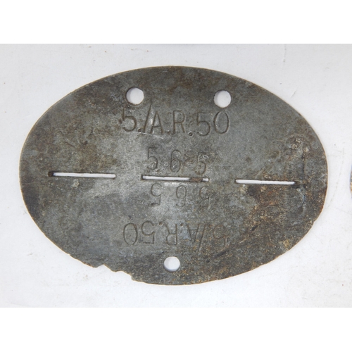 380 - WWII German Erkennungsmarke (Identification Tag): this was the standard-issue German military identi... 