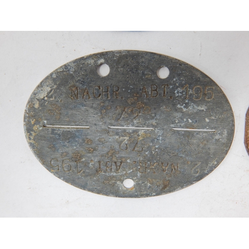 381 - WWII German Erkennungsmarke (Identification Tag): this was the standard-issue German military identi... 