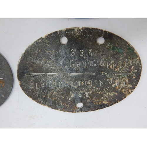 383 - WWII German Erkennungsmarke (Identification Tag): this was the standard-issue German military identi... 