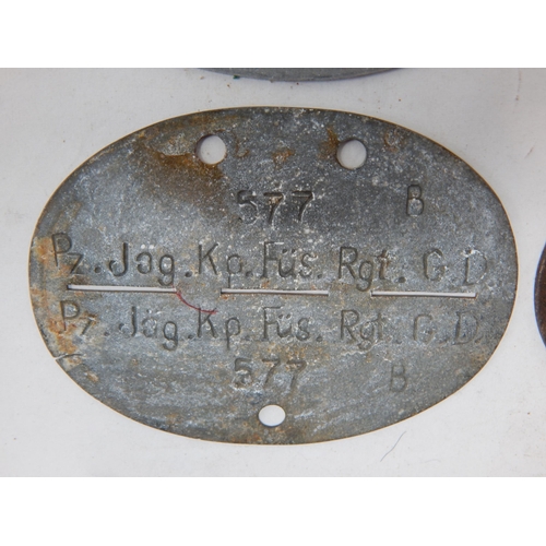 385 - WWII German Erkennungsmarke (Identification Tag): this was the standard-issue German military identi... 