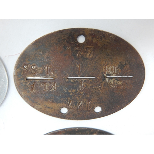 385 - WWII German Erkennungsmarke (Identification Tag): this was the standard-issue German military identi... 