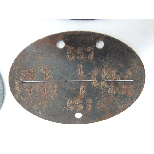 385 - WWII German Erkennungsmarke (Identification Tag): this was the standard-issue German military identi... 