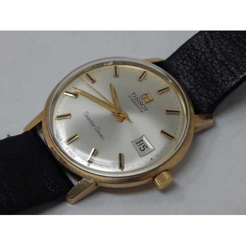 41 - Gent's 9ct Gold Tissot wristwatch on leather strap gross weight 33.29g