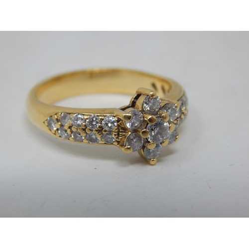 22 - 15ct gold ring set with 25 diamonds estimated @ 1.5cts, gross weight 5.69g