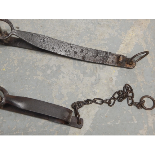 464 - Two 19th Century Cast Iron Traps. Largest 64cm