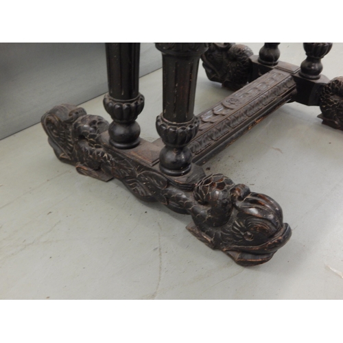 475 - 19th Century Carved Oak Table with Ringed Lion Mask Corners, Masked Drawer & Dolphin Supports: 85cm ... 