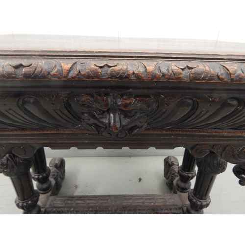 475 - 19th Century Carved Oak Table with Ringed Lion Mask Corners, Masked Drawer & Dolphin Supports: 85cm ... 