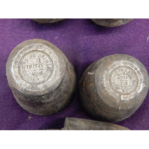 486 - A Set of 5 Cast Iron Token Dies by Jardill, Leeds for Co-Op, Godalming 1/2d, 1d & 2d