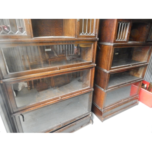 490 - A Pair of Four Section Globe Wernicke Glass Fronted Bookcases: Each Measuring 87cm wide