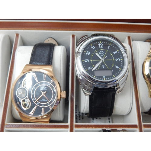 39 - Collection of Gents wristwatches in collectors case (7 watches)