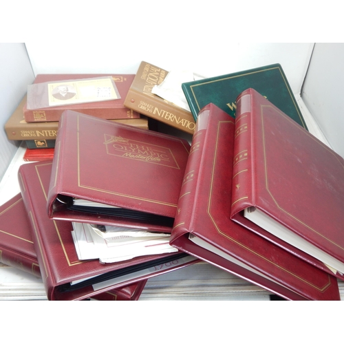 69 - A Quantity of Stamp Albums, Stock Books & FDC's contained in two large boxes. Sorting will reward