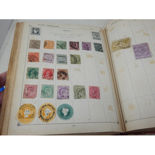 31 - Superb vintage Strand stamp album containing a massive collection of GB and world stamps