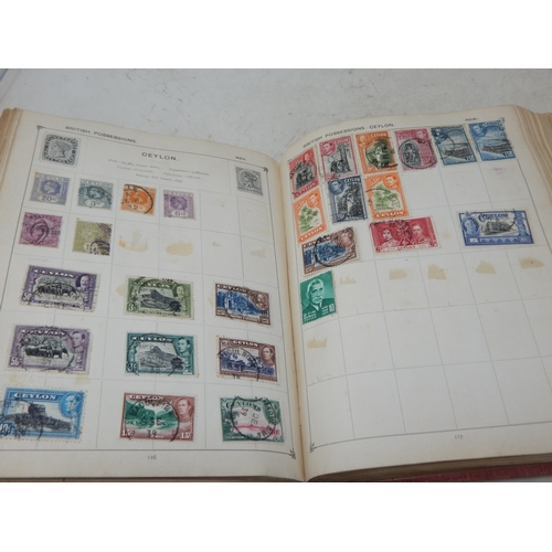 31 - Superb vintage Strand stamp album containing a massive collection of GB and world stamps