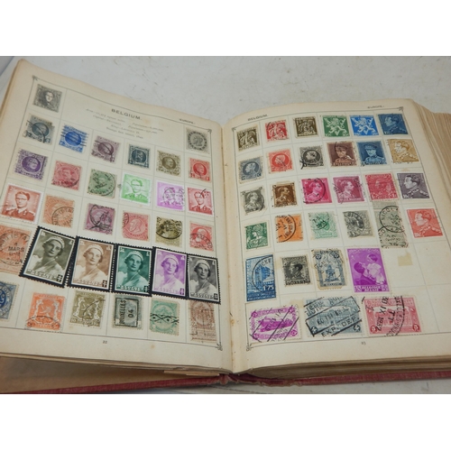 31 - Superb vintage Strand stamp album containing a massive collection of GB and world stamps