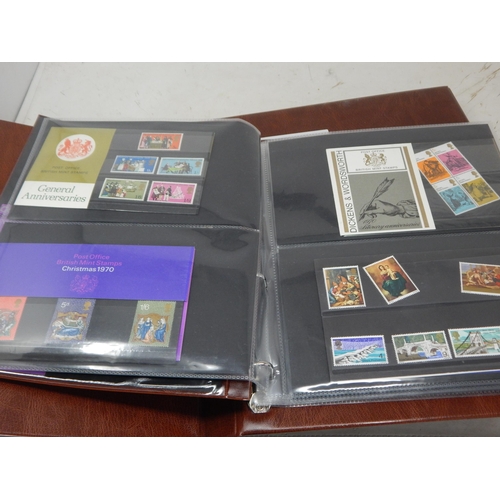 37 - Album containing a large selection of early pre-decimal mint Presentation packs of stamps