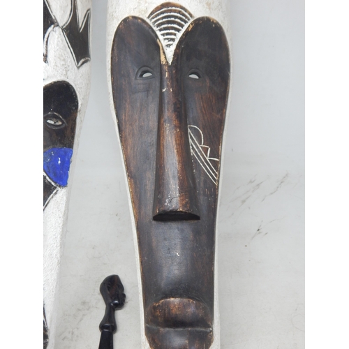 8 - 2 African tribal masks and wooden tribal dagger