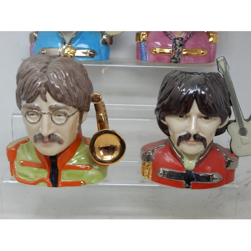 495 - A Set of The Beatles Character Jugs modelled by Ray Noble