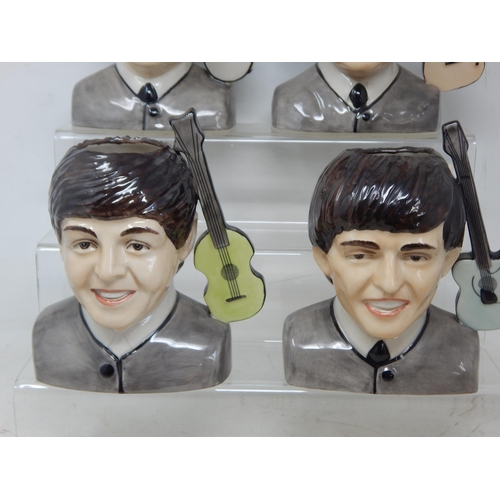 496 - A Set of The Beatles Character Jugs modelled by Ray Noble