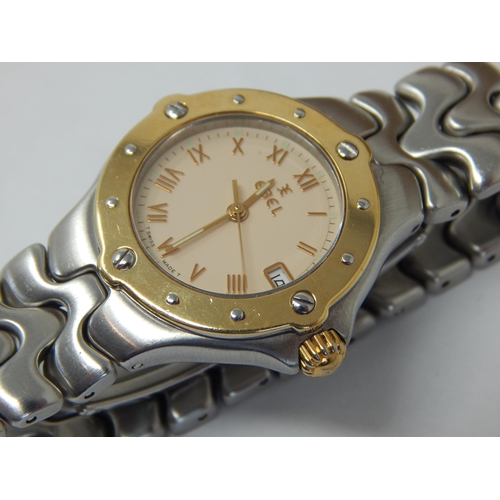 265 - Ladies Ebel Wristwatch with Date Aperture, Sweep Seconds Hand & Yellow Metal Bezel.