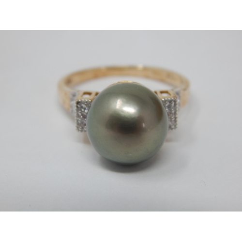 268 - Gold Ring Set with an 11mm Tahitian Pearl & White Zircons: Size N/O, gross weight 4.10g