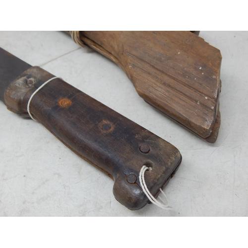 398G - WWII Machette, possibly Borneo in wooden sheath dated 1945 together with a stick bayonet