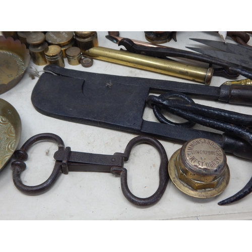 517 - A Quantity of Metalware Including Art Nouveau Chambersticks, Weights, Grappling Hooks, Radiator Caps... 