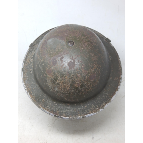 236 - Rare Steel Helmet With Cruise Visor, standard pattern British steel helmet with much of the original... 