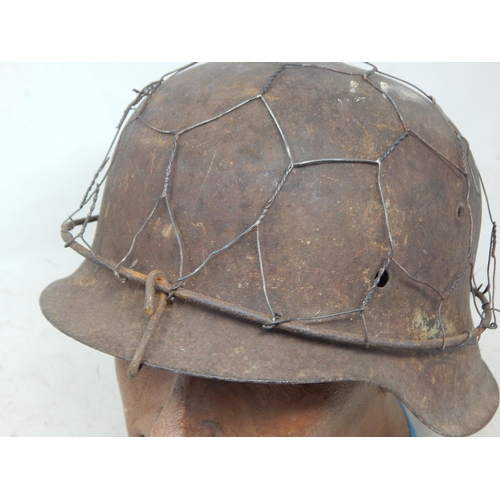 238 - WWII German Luftwaffe M40 Helmet Shell with Chicken Wire. Note: Customers must satisfy themselves pr... 