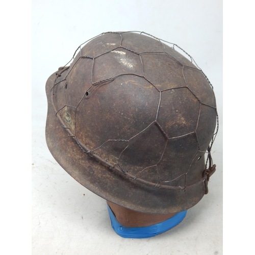 238 - WWII German Luftwaffe M40 Helmet Shell with Chicken Wire. Note: Customers must satisfy themselves pr... 