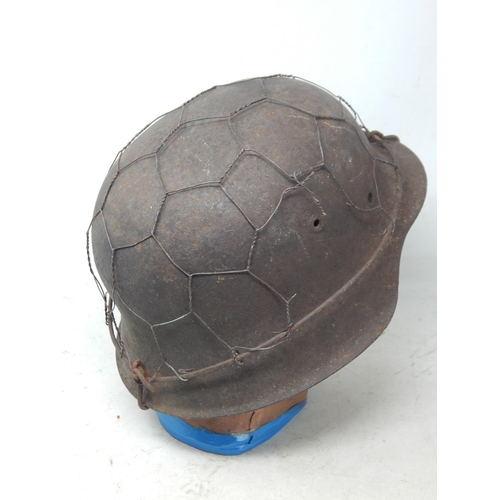 238 - WWII German Luftwaffe M40 Helmet Shell with Chicken Wire. Note: Customers must satisfy themselves pr... 