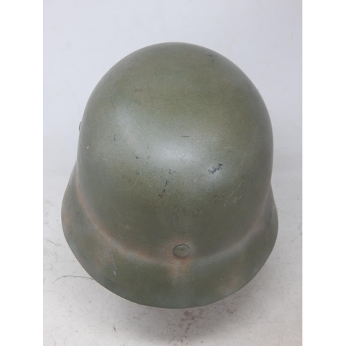 242 - WWII German Helmet with Double Decals. Note: Customers must satisfy themselves prior to bidding in r... 