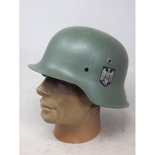 243 - WWII German Helmet with Double Decals. Note: Customers must satisfy themselves prior to bidding in r... 