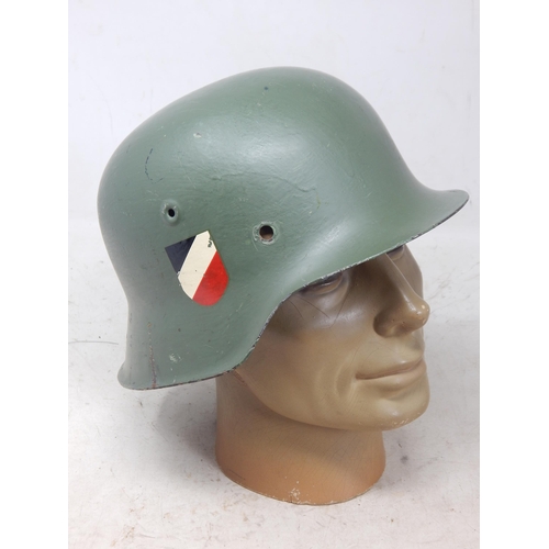 243 - WWII German Helmet with Double Decals. Note: Customers must satisfy themselves prior to bidding in r... 