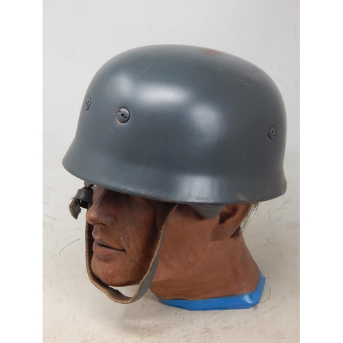 244 - WWII German Paratroopers Helmet. Note: Customers must satisfy themselves prior to bidding in regard ... 